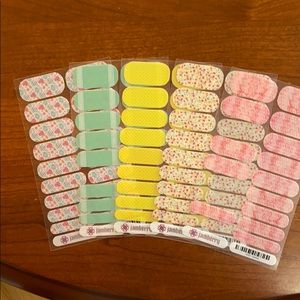 Three full and two partial Jamberry sheets